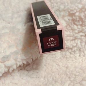 Flesh Hot Sauce lip gloss, a snow globe